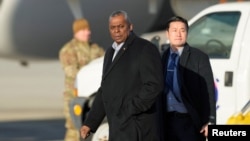 U.S. Secretary of Defense Lloyd Austin walks to board a helicopter upon his arrival at the Osan Air Base in Pyeongtaek, South Korea Jan. 30, 2023. 