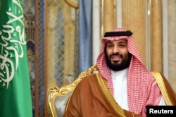 FILE - Saudi Arabia's Crown Prince Mohammed bin Salman attends a meeting with U.S. Secretary of State Mike Pompeo in Jeddah, Saudi Arabia, September 18, 2019. Mandel Ngan/Pool via REUTERS/File Photo