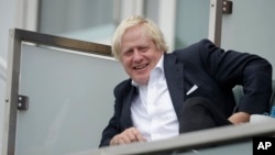 Britain's former Foreign Secretary Boris Johnson attends the fifth cricket test match of a five match series between England and India at the Oval cricket ground in London, Sept. 8, 2018. 