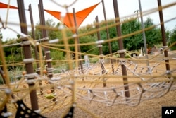 A children's playground is unused in the heat on June 25, 2024, in Phoenix, Arizona. Very young children, older adults and homeless people are especially at risk for contact burns when surfaces become hot.