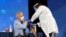 Dr. Anthony Fauci, director of the National Institute of Allergy and Infectious Diseases, receives his first dose of the new Moderna COVID-19 vaccine at the National Institutes of Health, in Bethesda…