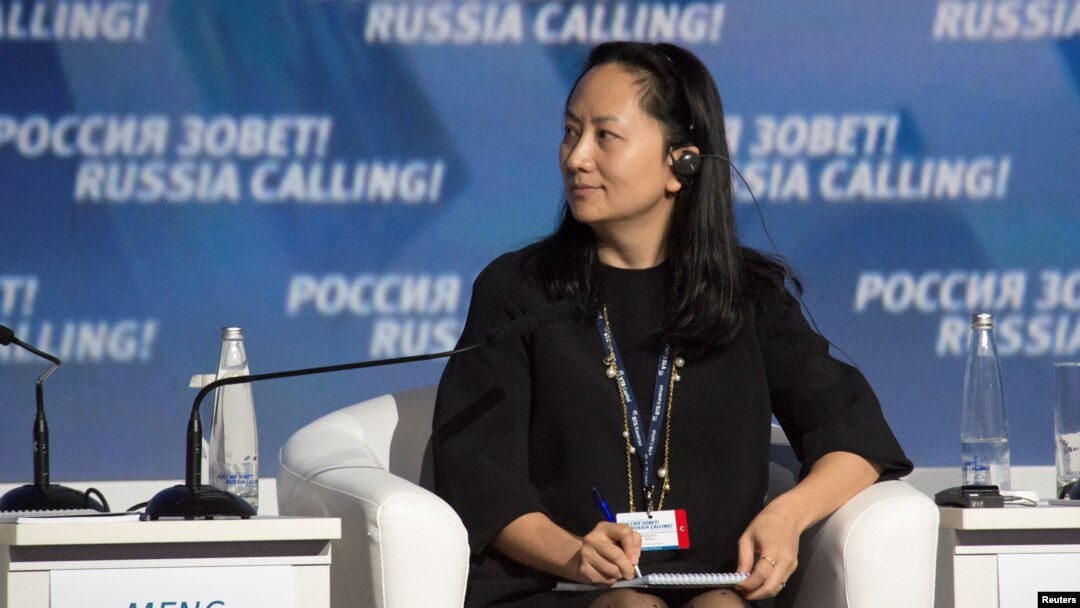 FILE - Meng Wanzhou, chief financial officer of Chinese technology giant Huawei, attends a session of the VTB Capital Investment Forum "Russia Calling!" in Moscow, Russia Oct. 2, 2014. 