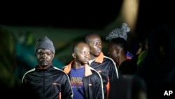 Des migrants nigérians revenus de Libye arrivent à l'aéroport de Lagos le 5 décembre 2017