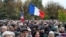 FILE —Protesters hold French national flags during a demonstration against anti-Semitism in Strasbourg, eastern France, on November 12, 2023. Over 100, 000 marched against anti-Semitism across France amid bickering by political parties over who should take part.