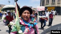 Supporters of former Bolivian President Evo Morales participate in a march in Cochabamba, Bolivia, Nov. 16, 2019. 
