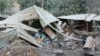 Houses are seen damaged from the eruption of Mount Lewotobi Laki-Laki in East Flores, Indonesia, Nov. 4, 2024. 