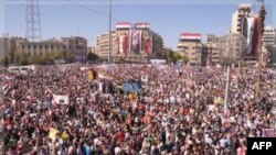 Çarşamba günü Halep'le yapılan Esat yanlısı gösteri