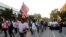 FILE - Demonstrators march in response to a not guilty verdict in the trial of former St. Louis police officer Jason Stockley in St. Louis, Sept. 16, 2017.