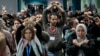 Activists demonstrate in silence as they protest a proposed deal for providing billions of dollars to developing nations to help offset the effects of climate change, at the COP29 U.N. Climate Summit, on Nov. 22, 2024, in Baku, Azerbaijan.