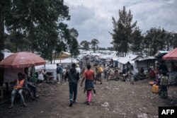 FILE - This photograph, taken on October 2, 2023, shows the market place of the Rusayo IDP camp, home to tens of thousands of war-displaced people, on the outskirts of Goma in the East of the Democratic Republic of Congo.