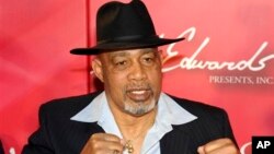 FILE - Former heavyweight boxer Ken Norton poses on the red carpet at the "Keep Memory Alive Gala" fundraiser honoring Muhammad Ali's 70th birthday at the MGM Grand Garden Arena in Las Vegas, Feb. 18, 2012. 