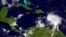 This GOES infrared and visible imagery shows storm activity in the Caribbean Sea region, Sept. 29, 2016.