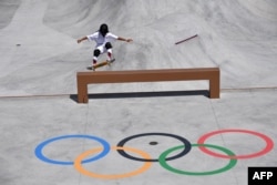 FILE - Japan's Kokona Hiraki competes in the women's park prelims heat 1 during the Tokyo 2020 Olympic Games at Ariake Sports Park Skateboarding in Tokyo on August 04, 2021. (Photo by Loic VENANCE / AFP)