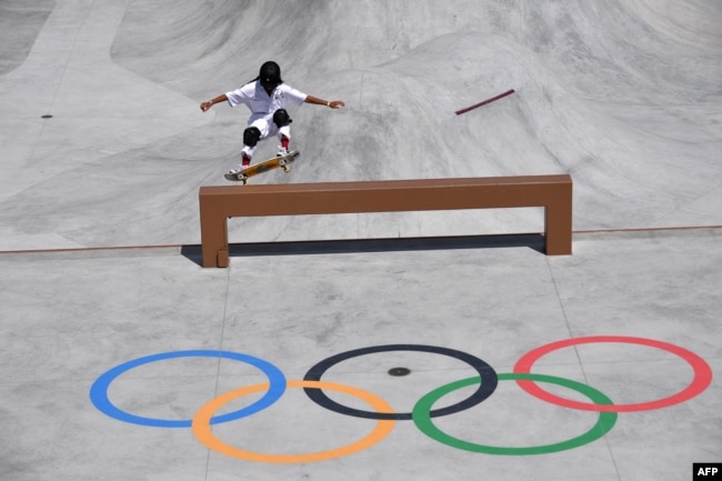 FILE - Japan's Kokona Hiraki competes in the women's park prelims heat 1 during the Tokyo 2020 Olympic Games at Ariake Sports Park Skateboarding in Tokyo on August 04, 2021. (Photo by Loic VENANCE / AFP)