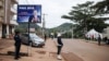 FILE - Police officers stand in front of the polling station where incumbent Cameroon President Paul Biya, is expected to vote, in Yaounde, Oct. 7, 2018. 