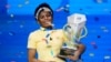 FILE - Zaila Avant-garde, 14, from Harvey, La., celebrates with the championship trophy after winning the finals of the 2021 Scripps National Spelling Bee at Disney World, July 8, 2021, in Lake Buena Vista, Fla. 