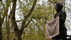 The statue of women's rights campaigner Millicent Fawcett in Parliament Square, London, April 24, 2018. Placement of the statue resulted from a campaign by feminist Caroline Criado-Perez, who said there were more statues in Britain of men called John than statues of women.