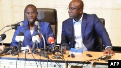 Clément Sawadogo, ministre de la Sécurité, et Remi Fulgence Dandjinou, ministre de la Communication et porte-parole du gouvernement , Ouagadougou, le 2 mars 2018