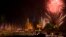 Fireworks light the sky over Wat Mahathat in celebration of the annual Loy Krathong festival in Thailand's Sukhothai Province, Nov. 12, 2008. Northern Thai airports have canceled flights this year due to lantern risks. 