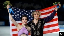 Meryl Davis dan Charlie White memenangkan medali emas untuk nomor dansa gaya bebas "figure-skating" Olimpiade Musim Dingin 2014 di Iceberg Skating Palace, Sochi, Rusia (17/2).