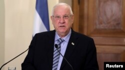 FILE - Israeli President Reuven Rivlin talks during a press conference at the Presidential Palace in Nicosia, Cyprus, Feb. 12, 2019. 