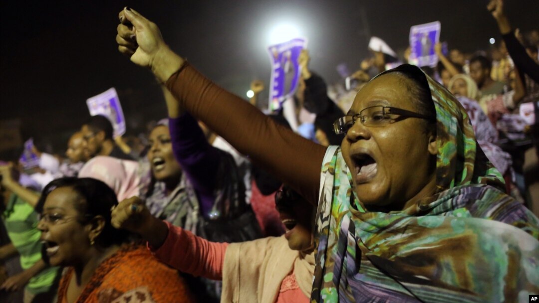 Sudanese anti-government protesters chant slogans during a demonstration in Khartoum, Sudan, Sunday, Sept. 29, 2013. 
