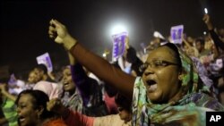 Sudanese anti-government protesters chant slogans during a demonstration in Khartoum, Sudan, Sunday, Sept. 29, 2013. 