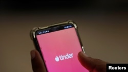 The dating app Tinder is shown on a mobile phone, Sept. 1, 2020. 