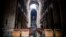 A view of the damaged roof and debris inside Notre-Dame de Paris in the aftermath of a fire that devastated the cathedral during the visit of French Interior Minister Christophe Castaner (not pictured) in Paris, France, April 16, 2019.