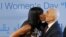 British model Naomi Campbell kisses former Israeli President Shimon Peres after he gave her an award during an event marking International Women's Day at the Peres Center for Peace in Jaffa, near Tel Aviv, Israel.