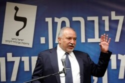 FILE - Israel's former Defense Minister Avigdor Lieberman speaks during his Yisrael Beitenu party faction meeting at the Knesset, Israel's parliament, in Jerusalem, May 27, 2019.