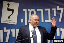 FILE - Israel's former Defense Minister Avigdor Lieberman speaks during his Yisrael Beitenu party faction meeting at the Knesset, Israel's parliament, in Jerusalem, May 27, 2019.