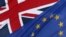 The EU and British flags fly outside the European Commission Representation in central London, Jan. 23, 2013.