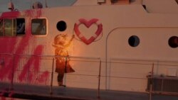 In this still image taken from video, a Banksy graffiti in seen on the Louise Michel, a migrant search-and-rescue ship operating in the Mediterranean, Aug. 17, 2020. (MV Louise Michel/Reuters)