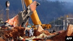 A general view shows the salvage operation of the Jeju Air Boeing 737-800 aircraft that crashed and burned at Muan International Airport in Muan, South Korea, Jan. 4, 2025. 