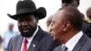  South Sudan President Salva Kiir (L) meets his Kenyan counterpart Uhuru Kenyatta, who is on his first visit to the region as head of state, in Juba, South Sudan, May 23, 2013.