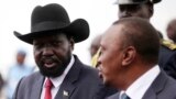 FILE - South Sudan President Salva Kiir, left, meets his Kenyan counterpart, Uhuru Kenyatta, who is on his first visit to the region as head of state, in Juba, South Sudan, May 23, 2013.