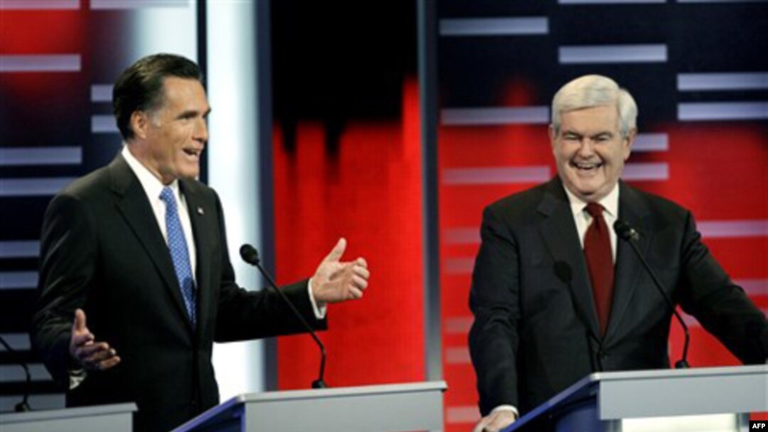 Prezidentlikka da'vogar respublikachi Ayovada debat paytida, Mitt ROmni (chapda) va Nyut Gingrich, 10-dekabr, 2011-yil