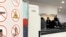 FILE - Passengers walk next to Nuctech security scanners at the Brussels Eurostar train terminal on Monday, Jan. 17, 2022. 