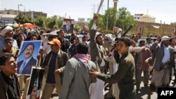 Sledbenici jemenskog predsednika tokom sukoba sa anti-vladinim demonstrantima, Sana, 14. februar, 2011.