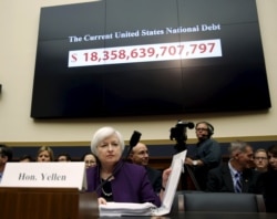 FILE - Then-Federal Reserve Board Chair Janet Yellen closes her notes before testifying before the House Financial Services Committee on the "Federal Reserve's Supervision and Regulation of the Financial System" in Washington Nov. 4, 2015.