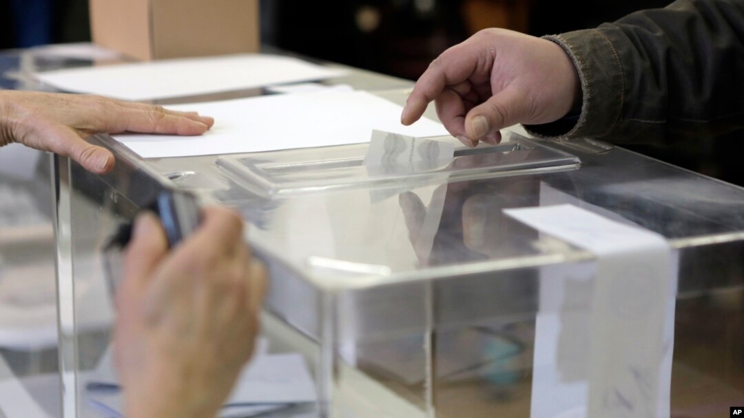 Voter casts his vote at a polling station in Sofia, April 2, 2023.