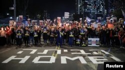 Supporters of Israeli hostages, kidnapped during the deadly Oct. 7, 2023, attack by Hamas, protest amid ongoing negotiations for a ceasefire in Gaza, in Tel Aviv, Israel, Jan. 13, 2025. 