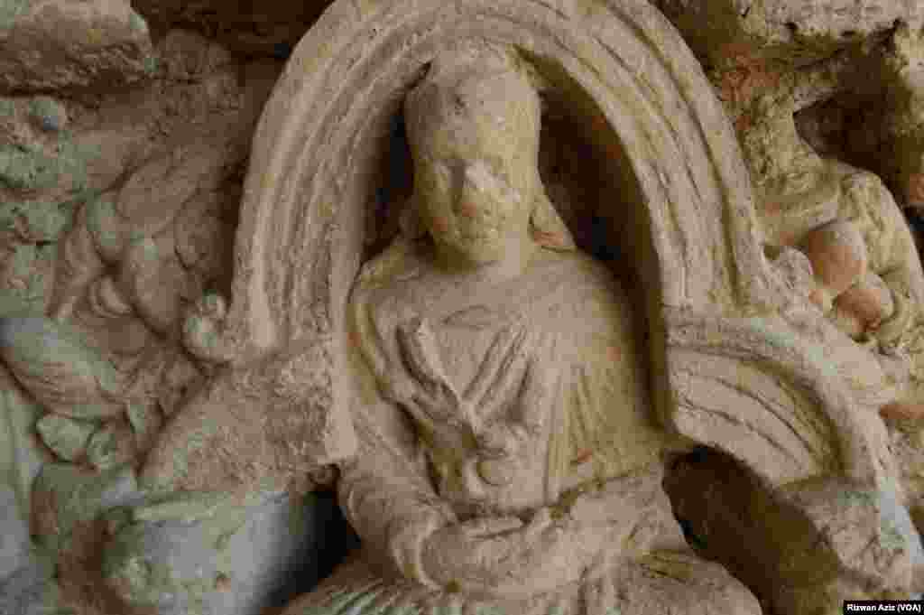 بدھا کا ایک مجسمہ۔