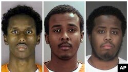 A combination picture shows, left to right, defendants Guled Ali Omar, Abdirahman Daud and Mohamed Farah. Of the nine men found guilty, Omar received the longest sentence, 35 years, with Daud and Farah getting 30 years each. The remaining six men received shorter sentences, with one being released for time served.