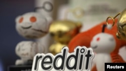 FILE - Reddit mascots are displayed at the company's headquarters in San Francisco, California