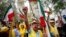 FILE - Mort Zadeh, of Indianapolis, center, shouts during a rally against Iranian President Hassan Rouhani outside United Nations headquarters ahead of the leader's address to the 70th session of the U.N. General Assembly, Monday, Sept. 28, 2015, in New York. 