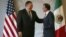 U.S. Secretary of State Mike Pompeo, left, and Mexican Foreign Minister Luis Videgaray smile after a press conference in Mexico City, July 13, 2018.