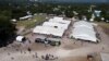 Para migran berkumpul di sebuah kamp, di San Pedro Tapanatepec, Meksiko, 13 November 2022. (Foto: REUTERS/Jose de Jesus Cortes)