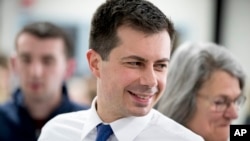 Democratic presidential candidate Pete Buttigieg greats members of the audience at a campaign stop at Chickasaw Event Center, in New Hampton, Iowa, Jan. 29, 2020,